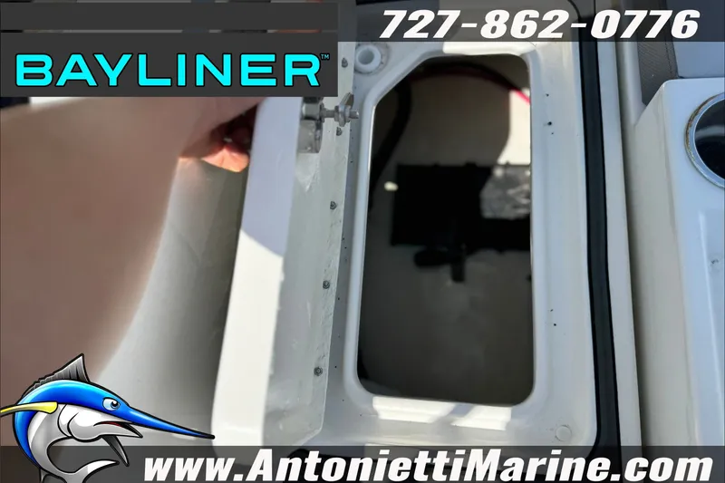 Slide: The Image of Bayliner D22 boat compartment, 2026 model, with contact info and logo. - 29