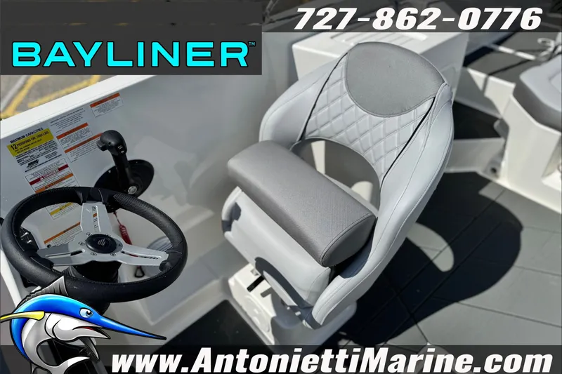 Slide: The Image of 2026 Bayliner D22 boat interior with steering wheel and captain's chair, Antonietti Marine branding. - 14