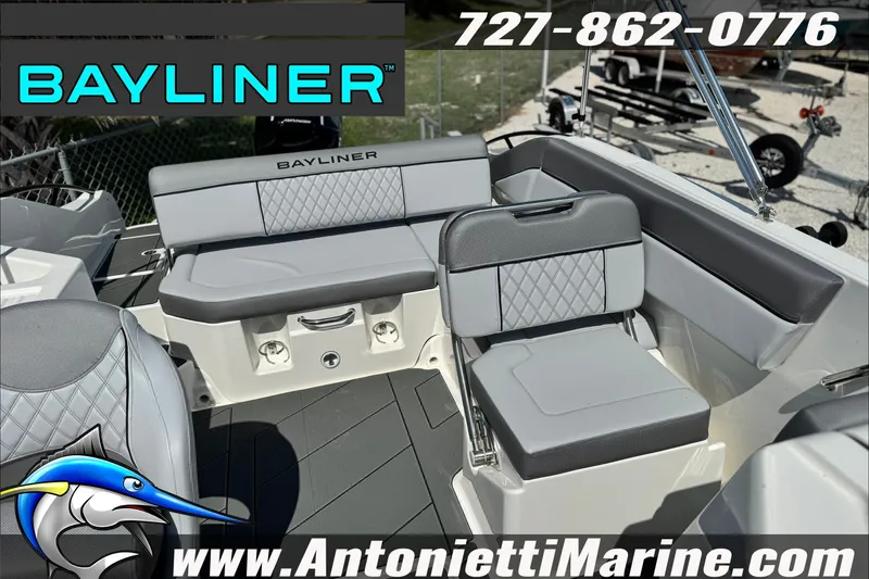 Slide: The Image of 2026 Bayliner D22 boat interior with gray seating, displayed by Antonietti Marine. - 13
