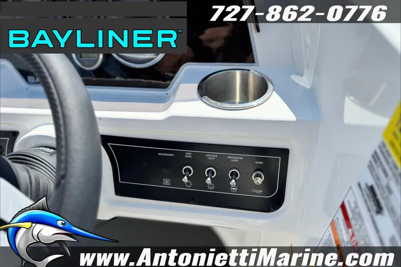 Slide: The Image of Control panel of 2026 Bayliner D22 boat with switches and cup holder, Antonietti Marine branding. - 18