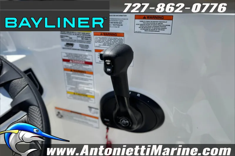 Slide: The Image of Bayliner D22 2026 boat control panel with throttle lever and warning labels. - 19