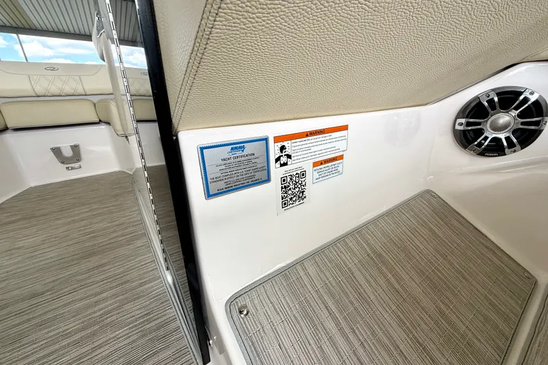 Slide: The Image of 2019 Regal LS6 interior with yacht certification and speaker detail. - 32