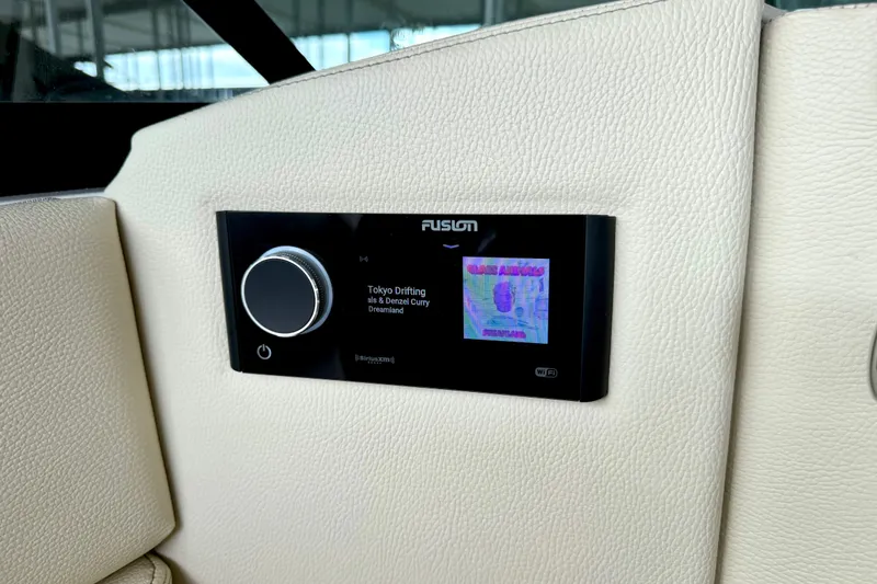 Slide: The Image of Fusion audio system in 2019 Regal LS6 boat, displaying "Tokyo Drifting" track. - 27