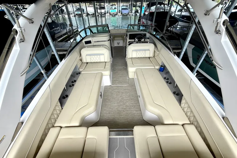 Slide: The Image of Luxurious interior of a 2019 Regal LS6 boat with beige seating and modern design. - 31