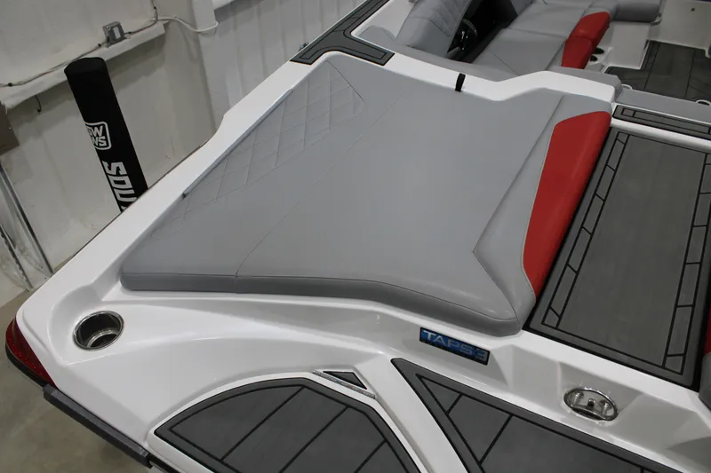 Slide: The Image of 2017 Tigé Z3 boat interior with gray and red seating, featuring TAPS 3 system. - 16