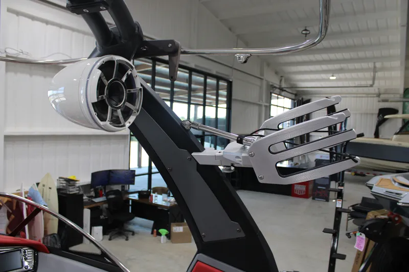 Slide: The Image of 2017 Tigé Z3 boat tower with speaker and wakeboard rack in a showroom. - 14