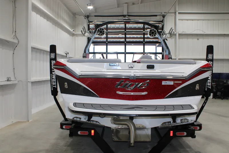 Slide: The Image of 2017 Tigé Z3 boat in a garage, showcasing rear design and branding. - 18