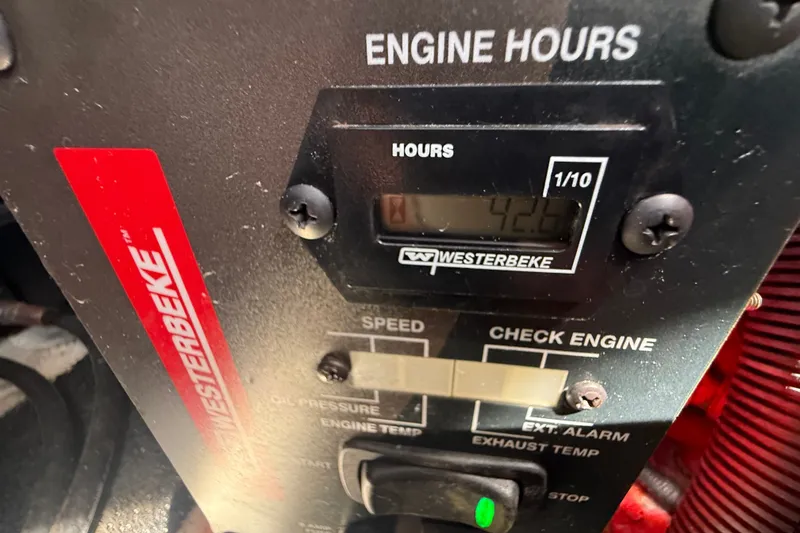 Slide: The Image of Westerbeke engine hour meter displaying 42.6 hours on a 2023 Regal 26 XO boat. - 38