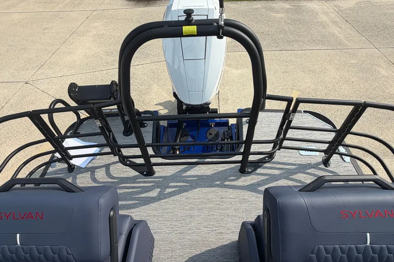 Slide: The Image of 2027 Sylvan G5 LZ DC boat interior with seating and motor view. - 23