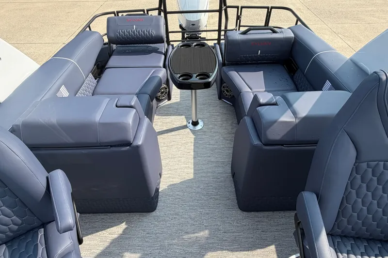 Slide: The Image of Luxurious interior of 2027 Sylvan G5 LZ DC pontoon boat with plush seating and table. - 21