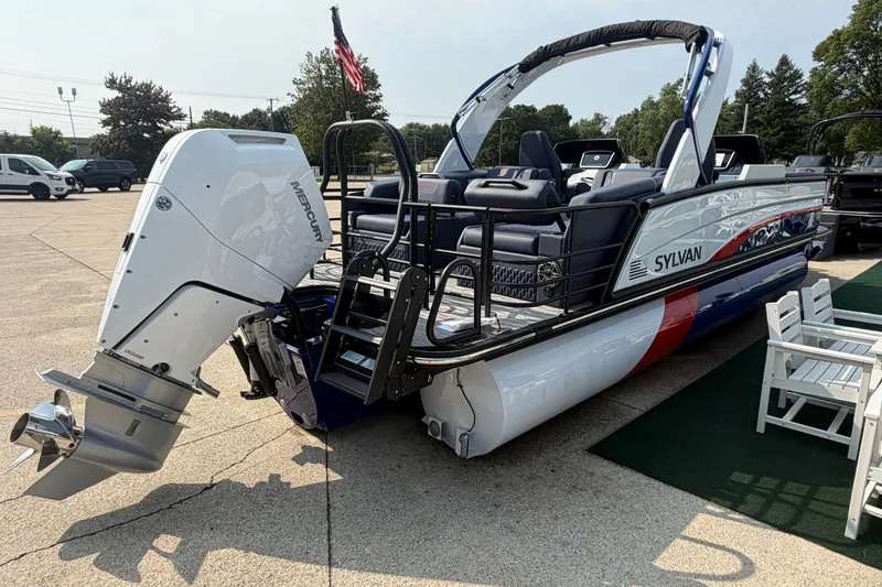 Slide: The Image of 2027 Sylvan G5 LZ DC pontoon boat with Mercury outboard motor, parked outdoors. - 6
