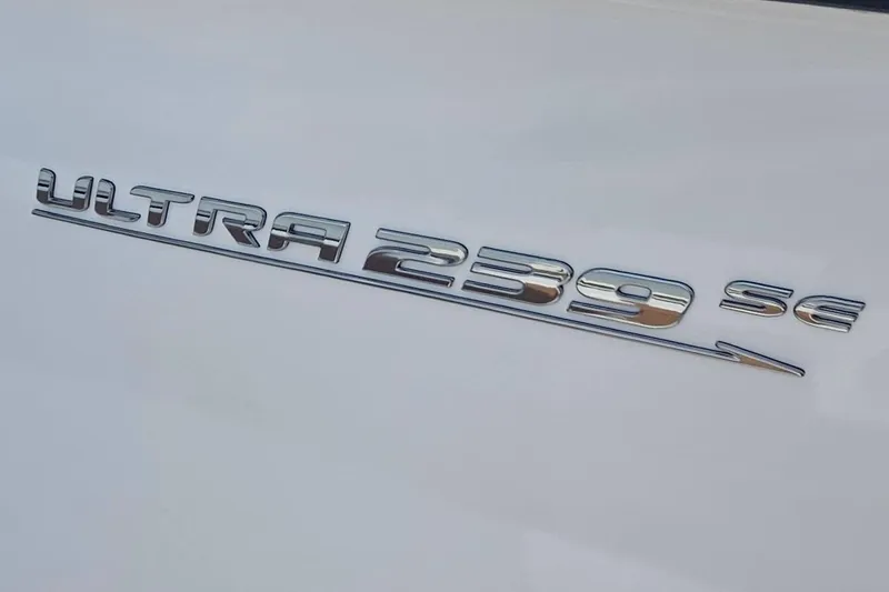 Slide: The Image of 2027 Sea Hunt Ultra 239 SE logo on white surface. - 30