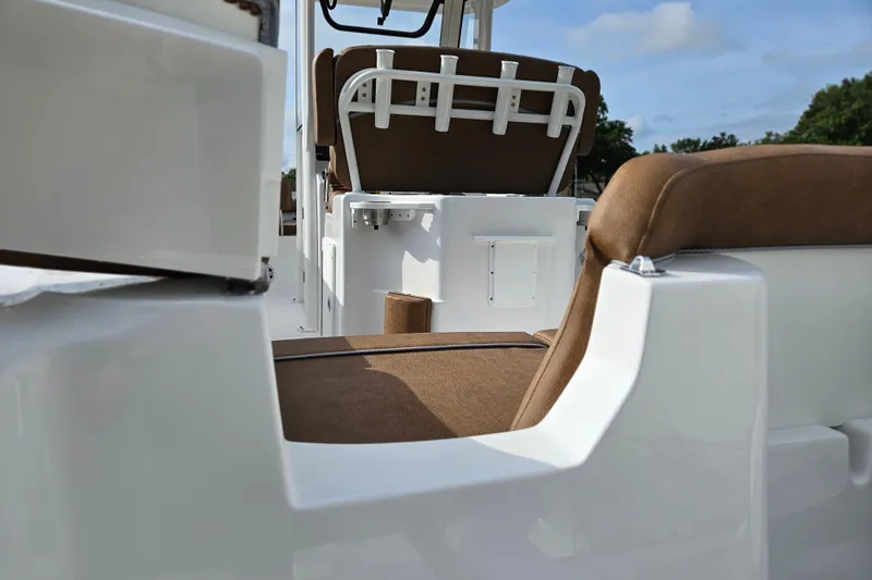 Slide: The Image of Interior view of 2027 Sea Hunt Ultra 239 SE boat with brown seating. - 5