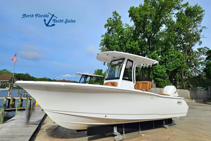 The Image of 2027 Sea Hunt Ultra 239 SE boat at North Florida Yacht Sales dock. - 1