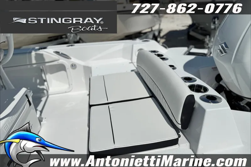 Slide: The Image of Stingray 24 HY boat interior with seating and cup holders, 2027 model. - 6