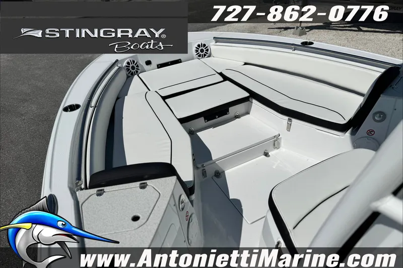 Slide: The Image of Stingray 24 HY boat interior with seating, contact info, and Antonietti Marine branding. - 8