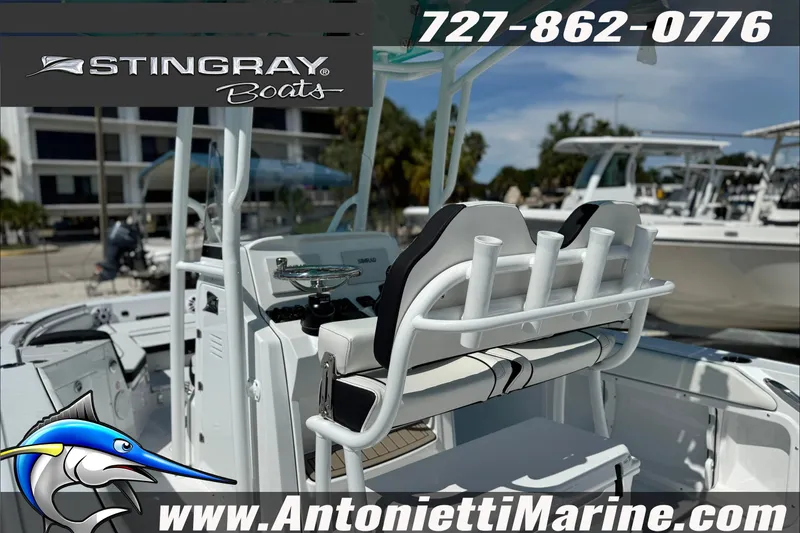 Slide: The Image of 2027 Stingray 24 HY boat interior with rod holders, showcased by Antonietti Marine. - 5