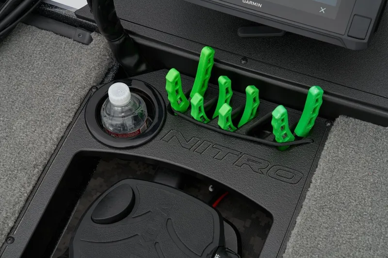 Slide: The Image of Interior of 2027 Nitro Z20 XL Pro boat with cup holder and green tool holders. - 4