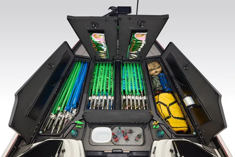 Slide: The Image of 2027 Nitro Z21 XL Pro boat storage compartments with fishing rods and gear. - 8