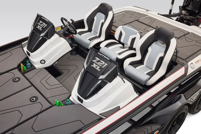 Slide: The Image of 2027 Nitro Z21 XL Pro boat interior with sleek seating and modern dashboard design. - 9