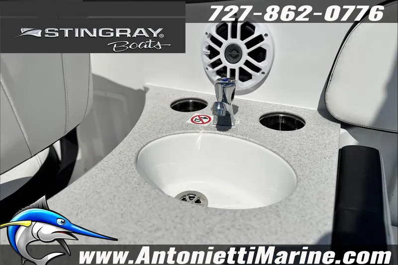 Slide: The Image of Stingray 24 DC boat interior with sink and speaker, 2027 model. - 27