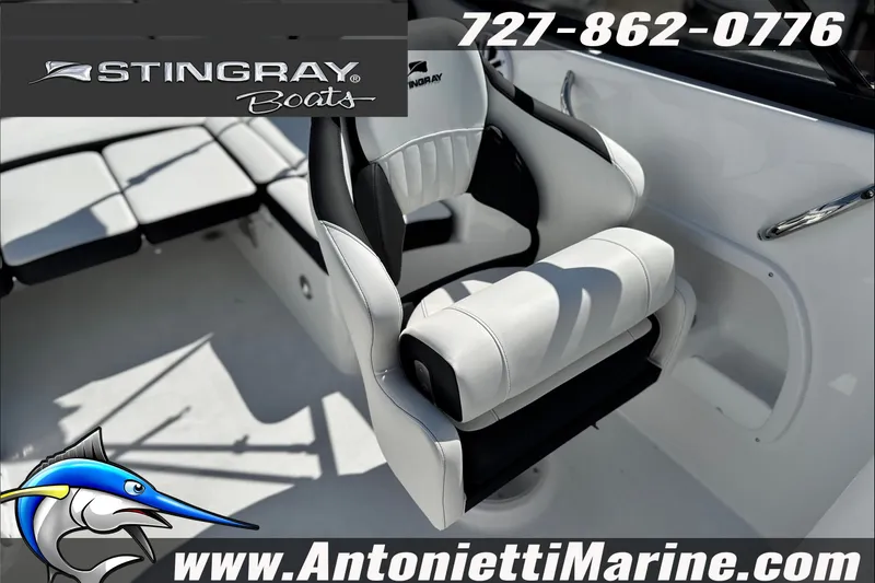 Slide: The Image of 2027 Stingray 24 DC boat interior with white seating, Antonietti Marine branding. - 25