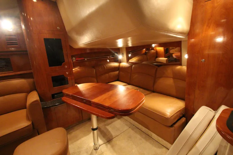 Slide: The Image of Luxurious interior of 2007 Four Winns 378 Vista yacht with elegant wood and leather seating. - 30