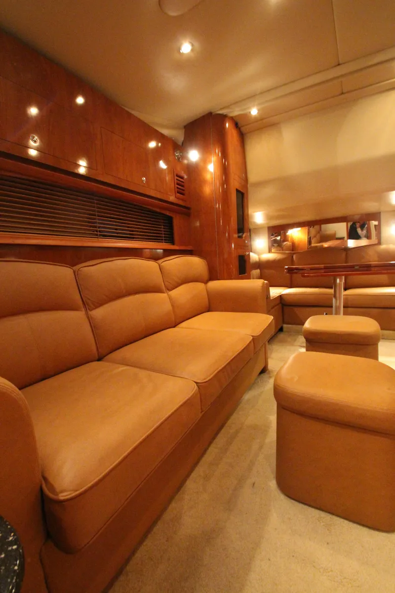 Slide: The Image of Luxurious interior of 2007 Four Winns 378 Vista yacht with plush seating and warm lighting. - 29