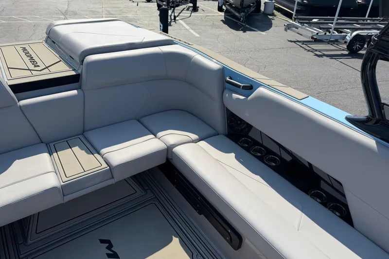 Slide: The Image of 2025 Moomba Tykon boat interior with sleek seating and modern design. - 9