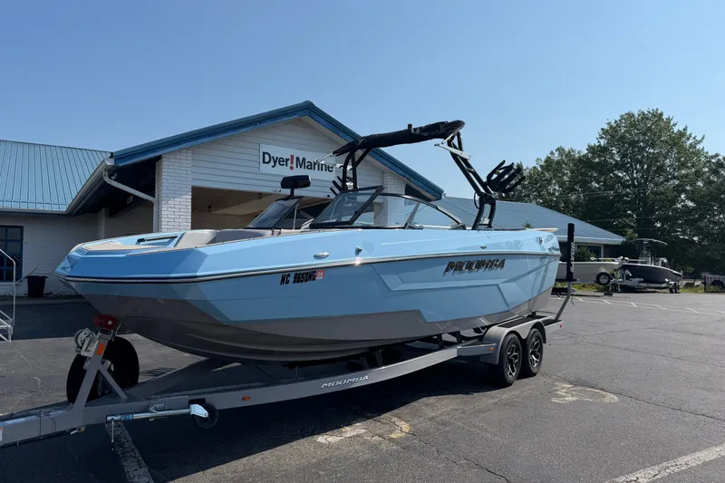 The Image of 2025 Moomba Tykon boat on trailer at Dyer Marine dealership. - 1