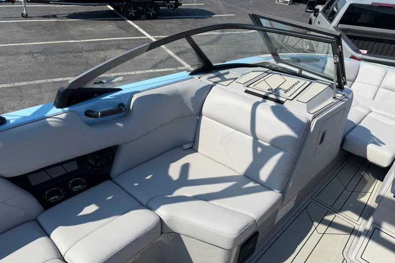 Slide: The Image of 2025 Moomba Tykon boat interior with sleek seating and modern design. - 10