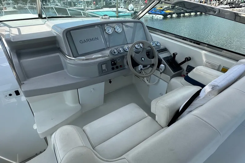 Slide: The Image of Cockpit of 1999 Formula 400 Super Sport boat with Garmin navigation system. - 8