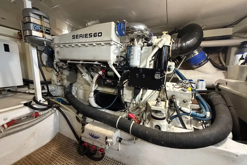 Slide: The Image of Engine room of a 2007 Post 50 Convertible yacht with Series 60 engine. - 108
