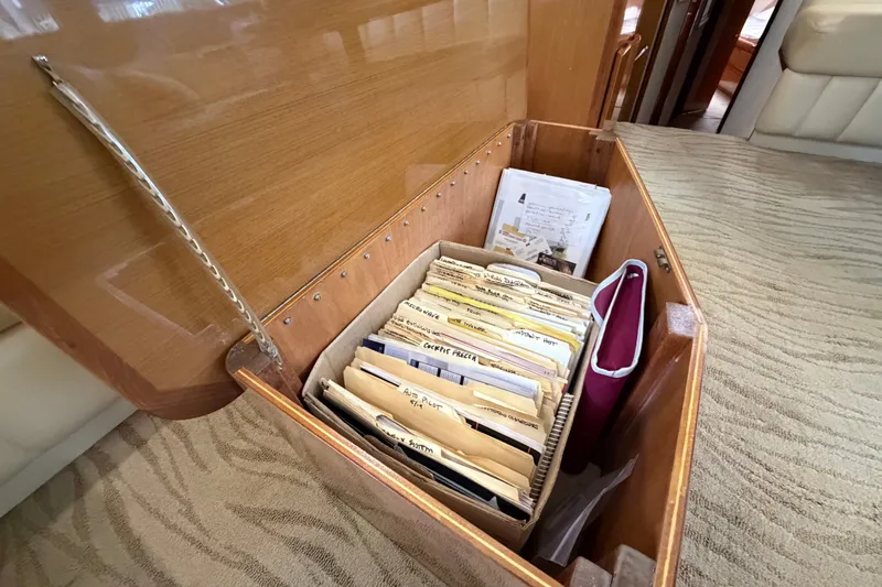 Slide: The Image of Storage compartment in 2007 Post 50 Convertible, containing organized files and documents. - 61