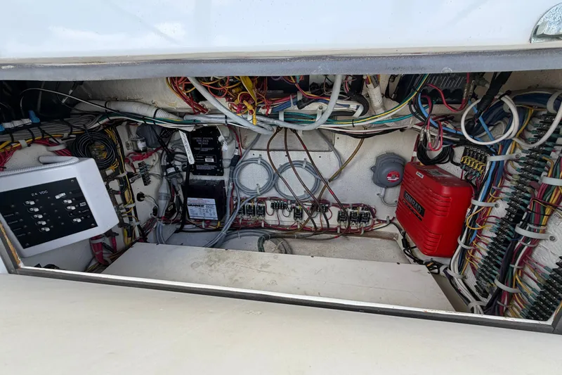 Slide: The Image of Electrical wiring and components inside a 2007 Post 50 Convertible boat. - 37