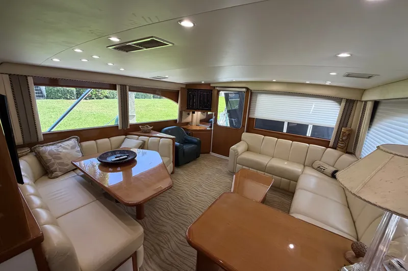 Slide: The Image of Luxurious interior of a 2007 Post 50 Convertible yacht with plush seating and elegant decor. - 55