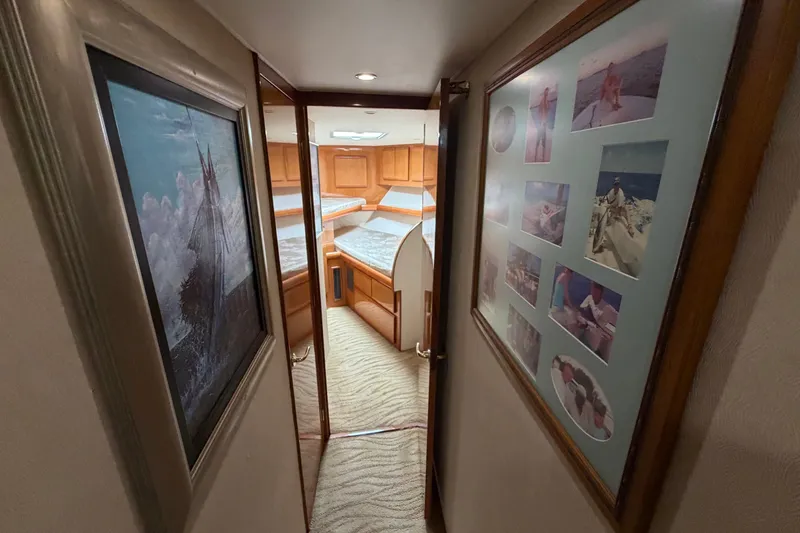Slide: The Image of Narrow hallway in 2007 Post 50 Convertible yacht with framed photos and artwork. - 87