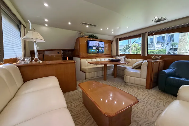 Slide: The Image of Luxurious 2007 Post 50 Convertible yacht interior with plush seating and elegant wood finishes. - 44
