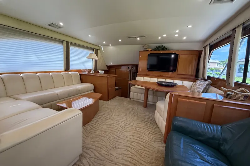 Slide: The Image of Luxurious interior of a 2007 Post 50 Convertible yacht with plush seating and elegant decor. - 41
