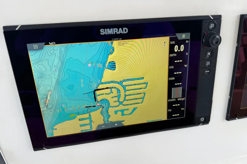 Slide: The Image of Simrad marine navigation display on a 2007 Post 50 Convertible boat. - 26