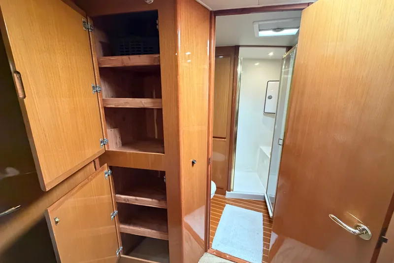 Slide: The Image of Wooden cabinetry and bathroom in 2007 Post 50 Convertible yacht interior. - 81