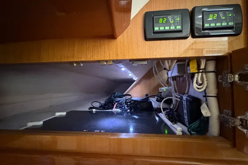 Slide: The Image of Interior view of a 2007 Post 50 Convertible yacht's electrical compartment. - 69