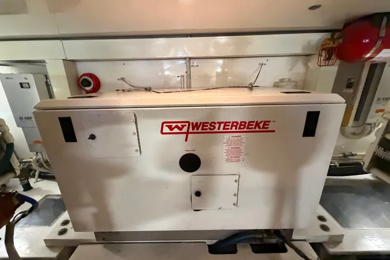 Slide: The Image of Engine room of 2007 Post 50 Convertible with Westerbeke generator. - 103