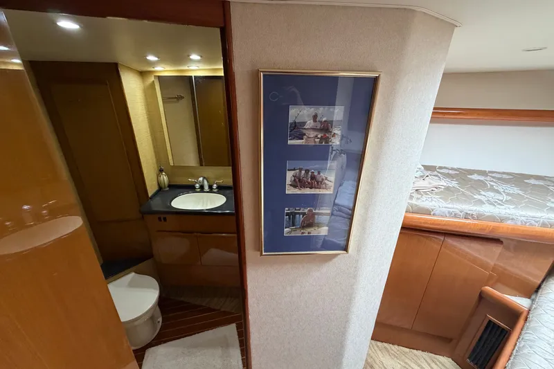 Slide: The Image of Luxurious 2007 Post 50 Convertible yacht interior with bathroom and cozy sleeping area. - 93