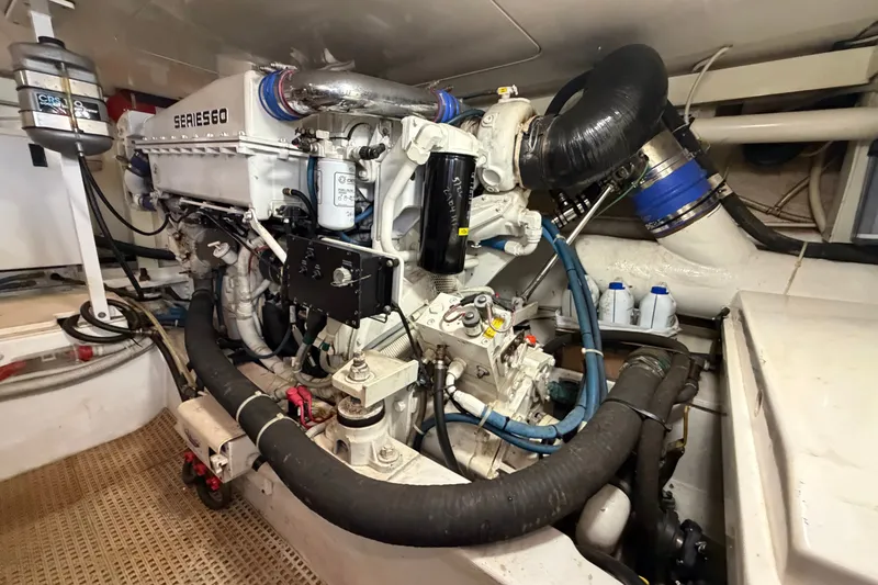 Slide: The Image of Engine room of a 2007 Post 50 Convertible yacht, featuring a Series 60 engine. - 110