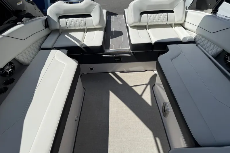 Slide: The Image of Luxurious interior of 2021 Regal LS6 boat with plush seating and modern design. - 7