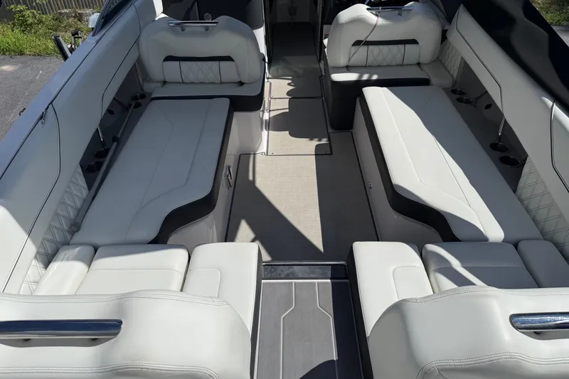 Slide: The Image of Luxurious interior of a 2021 Regal LS6 boat with elegant white seating. - 3
