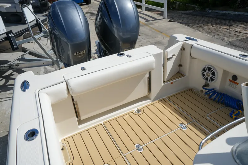Slide: The Image of 2008 Chris-Craft Catalina 26 boat deck with twin 150 horsepower engines. - 30