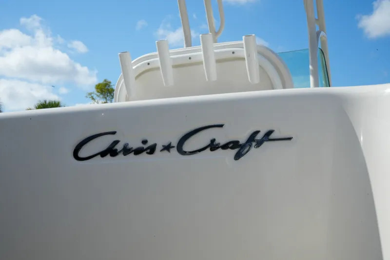 Slide: The Image of Chris-Craft Catalina 26 boat logo, 2008 model, against a clear blue sky. - 9