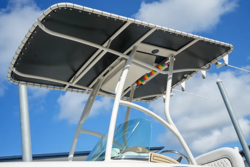 Slide: The Image of T-top of 2008 Chris-Craft Catalina 26 boat against a blue sky background. - 5